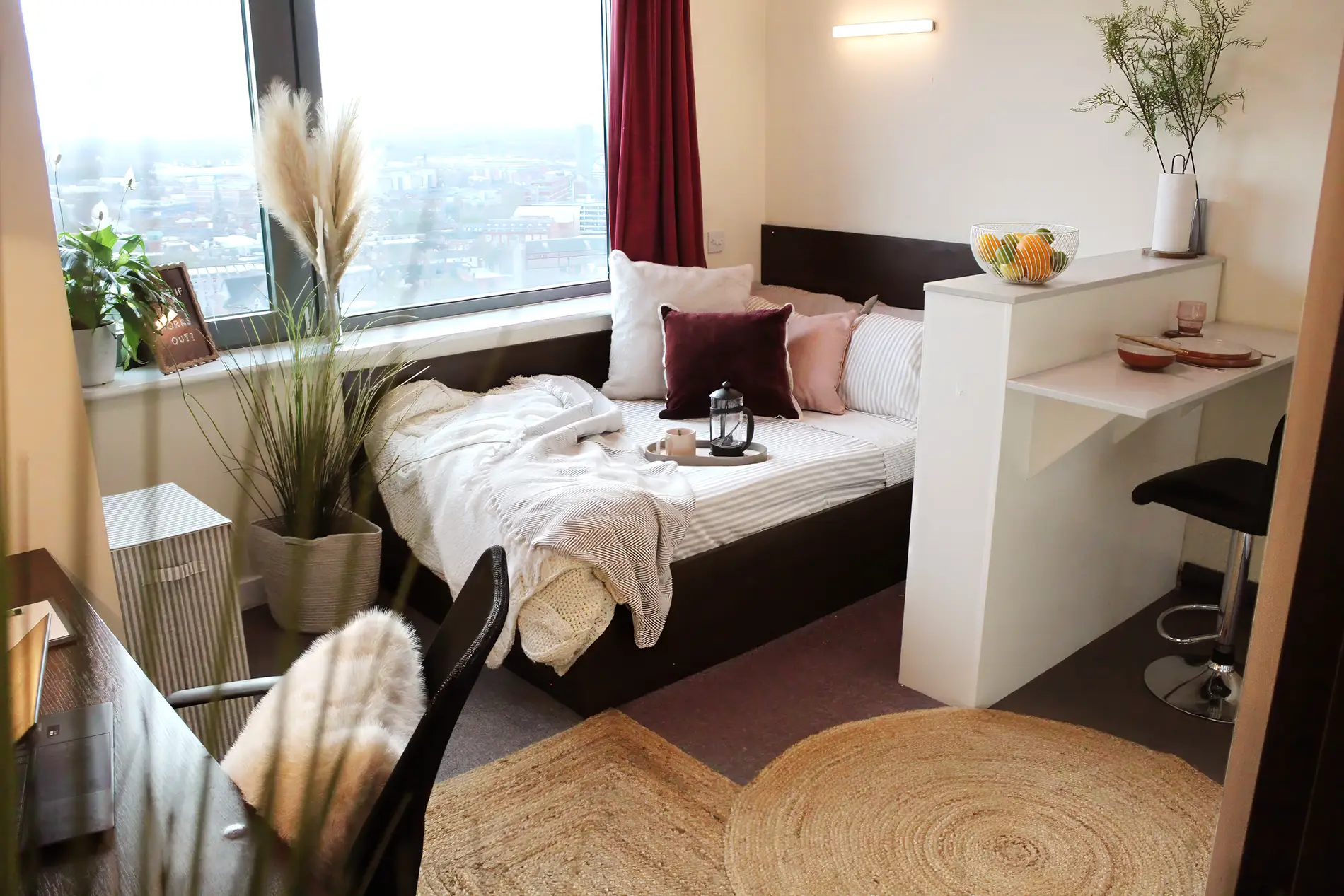 Premium Student studio in Leicester - view of the bed, desk and kitchen